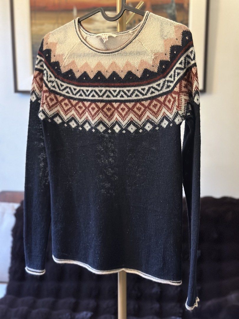 Esprit Fair Isle Knit Sweater (Category: Longsleeves) located in Manila. Submitted by timelessfindsbyjoann (Listing ID 1463710681, Image 3). Description: - Esprit sweater with classic Fair Isle pattern - Navy base with geometric designs in cream, rust, and pink - Long sleeves and crew neck - Comfortable knit fabric - Ideal for layering or wearing on its own - Pairs well with jeans or casual pants.