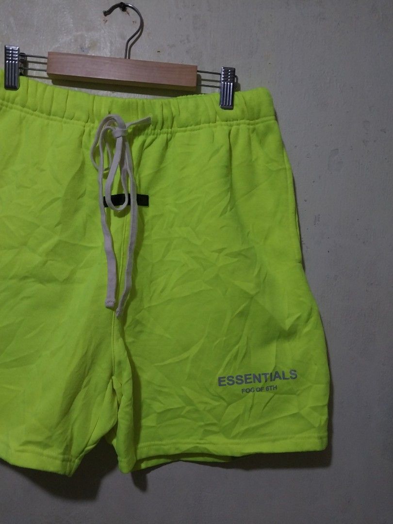 Essential neon green shorts (Category: Shorts) located in Manila. Submitted by PrinceDani.Clothing (Listing ID 1463686669, Image 2). Description: essential neon green shorts Size 30-34in waist 18in length excellent condition.