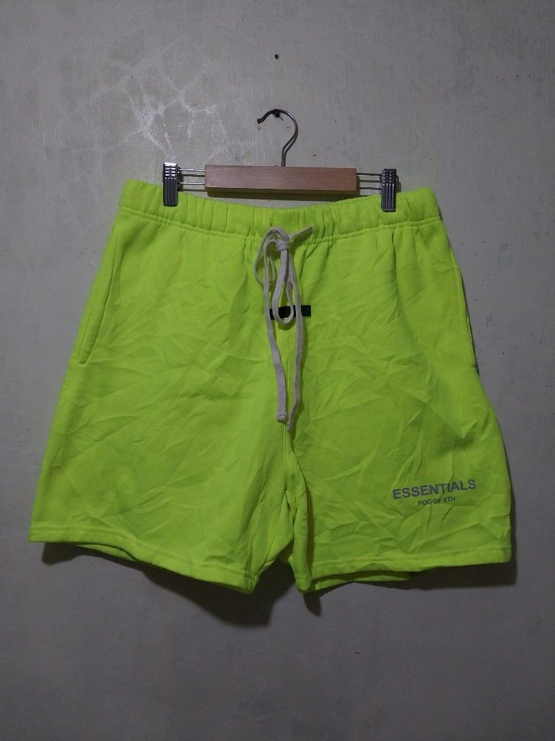 Essential neon green shorts (Category: Shorts) located in Manila. Submitted by PrinceDani.Clothing (Listing ID 1463686669, Image 1). Description: essential neon green shorts Size 30-34in waist 18in length excellent condition.