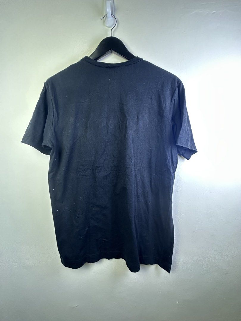 Fendi Black T-Shirt (Category: Shirts) located in Manila. Submitted by declutterpromax (Listing ID 1463607848, Image 2). Description: - Classic Fendi T-shirt - Color: Black with white Fendi logo - Material: 100% Cotton - Origin: Made in Italy - Style: Great for everyday wear - Care: Refer to tags for instructions.
