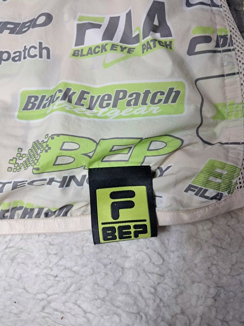 Fila fusion x Blackeyepatch AOP GRAPHICS windbreaker jacket (Category: Coats, Jackets and Outerwear) located in Baguio. Submitted by mishmashfritz (Listing ID 1463618882, Image 2). Description: Thrifted, like new, no flaws, mesh side part, velcro pocket sa back, zippered pockets sa front,.