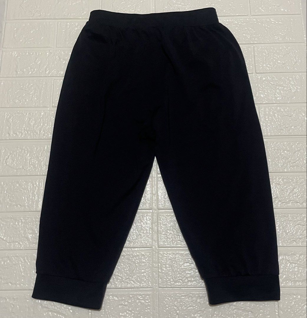 FILA RED Capri Jogger Pants Cropped (Category: Activewear) located in Marilao. Submitted by clear_out_closet (Listing ID 1463561959, Image 2). Description: Item Details: 👇 • Brand: FILA (RED Line) • Color: Dark Navy Blue / Black • Material: 91% Nylon, 9% Spandex - Smooth Technical Stretch Knit • Sizing: Tagged 165/68A (165) / Fits Women’s XS to Slim Small (Refer to flat measurements) • Style / Tag Codes: K62G023601 / NS01 • Additional Label Deta