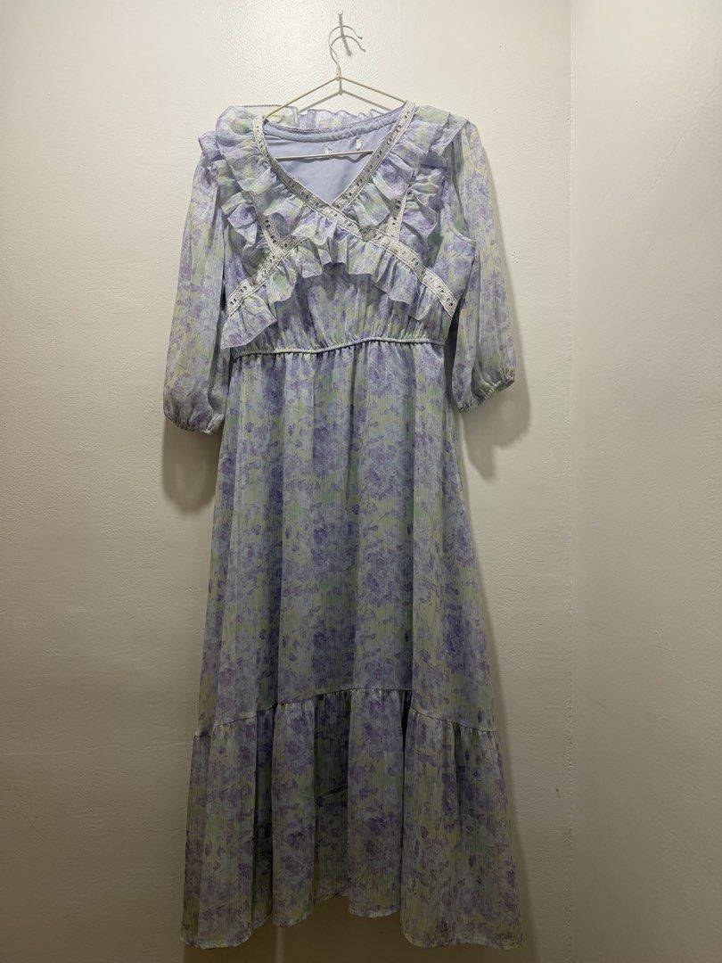 Floral Ruffle V-Neck Midi Dress (Category: Dresses) located in Rizal. Submitted by renee.ann (Listing ID 1463660021, Image 2). Description: - Lightweight midi dress - Pretty floral print - Ruffle and lace trim on neckline and sleeves - Elasticated waist for comfort - Flowy tiered hem - Ideal for casual outings or events.