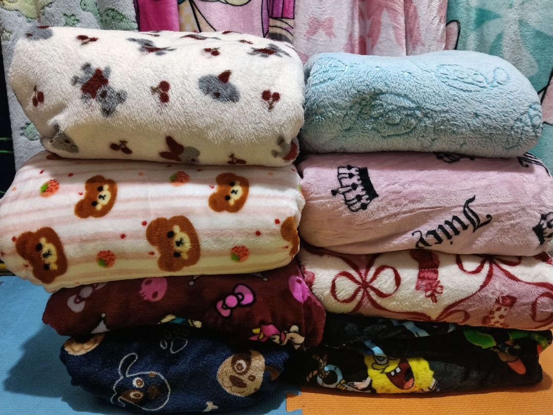 Fluffy Fleece Blankets - Various Cute Designs (Category: Bedding & Towels) located in Caloocan City. Submitted by rml.26 (Listing ID 1463720456, Image 2). Description: Super soft and cozy fleece blankets. Great for snuggling up on the couch or adding extra warmth to your bed. Lots of fun designs to choose from, including Stitch, LOL Surprise, dinosaurs, and cute animals. Perfect for kids and adults alike. Get yours today!.