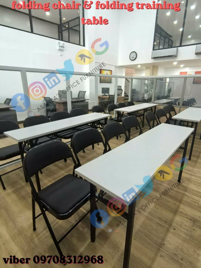 folding chair & folding table (Category: Tables & Sets) located in Quezon City. Submitted by asanzasmik45405 (Listing ID 1463609414, Image 2). Description: Folding Training Tables: These space-saving rectangular desks feature a clean white or light gray laminated worktop paired with a foldable black steel "H-style" tubular frame. Many variations include a practical integrated under-desk storage rack shelf for holding documents or personal belongi