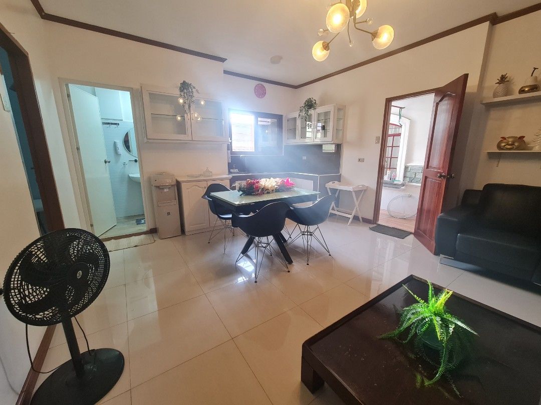 For Rent (Category: Room Rentals) located in Binan City. Submitted by reve_rtw (Listing ID 1463657584, Image 2). Description: Located at Juana 6, Southwoods, Biñan 🏠 Whole 2nd Floor Unit 🛏 3 bedrooms 🚿 2 bathrooms 🪴 Open Veranda 👨‍👩‍👧‍👦 Up to 6 person capacity Fully Furnished, which includes: ❄️ Airconed Rooms 🛀 Shower Heater 🧺 Washing Machine 🛋 Sofa 🛌 Bedframe and Mattress 🍽 Dinning Table and Chairs 🗄 Cabinets and Drawers 🍞 Toaste