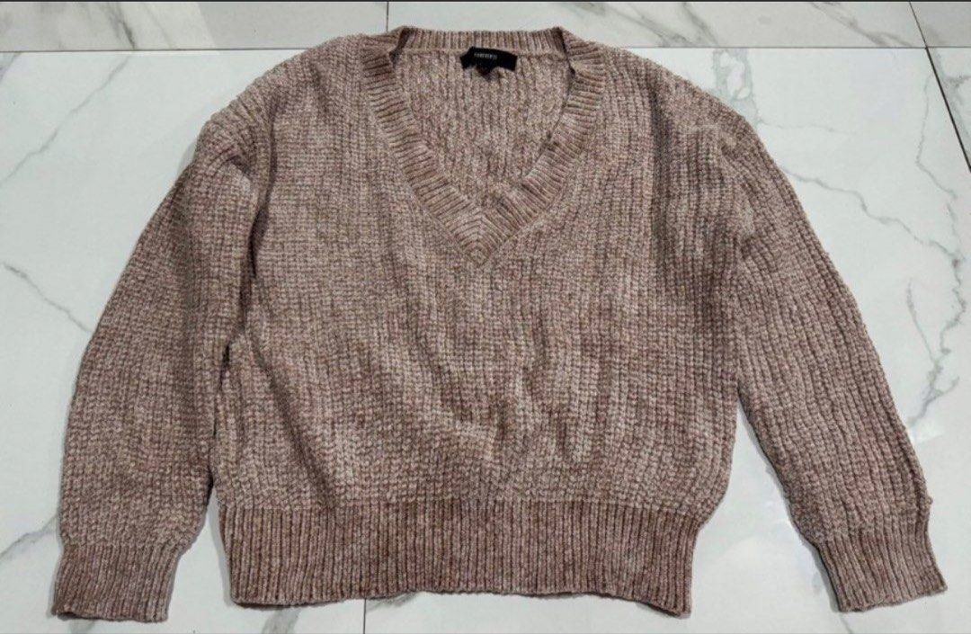 Forever 21 V-Neck Chenille Knit Sweater size S (Category: Coats, Jackets and Outerwear) located in Pasay City. Submitted by szepter (Listing ID 1463676832, Image 1). Description: - Cozy chenille knit sweater - Brand: Forever 21 - V-neckline - Relaxed fit - Textured knit detail - Versatile for layering or solo wear - Easy to style for a casual look.
