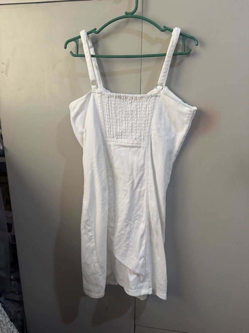 Forever 21 White Denim Button-Up Mini Dress (Category: Dresses) located in Valenzuela. Submitted by declutter203 (Listing ID 1463630253, Image 3). Description: - Like New - White denim mini dress from Forever 21 - Adjustable straps - Smocked back for a snug fit MOP: Gcash/Maribank MOD: J&T or Grab/lalamove Tags: Zara, H&M, Love Bonito, Mango, Bershka, Uniqlo, GU, Topshop.