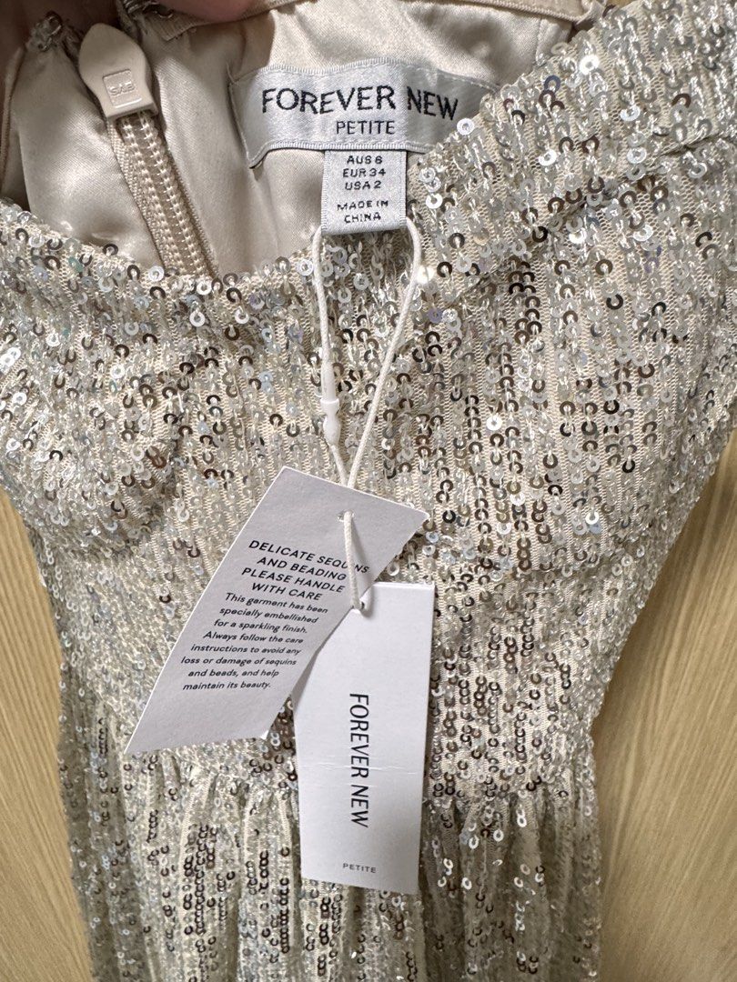 Forevernew Sequin Strapless mini dress BNWT (Category: Evening dresses & gowns) located in Tarlac. Submitted by annikafiffy (Listing ID 1463641547, Image 3). Description: .