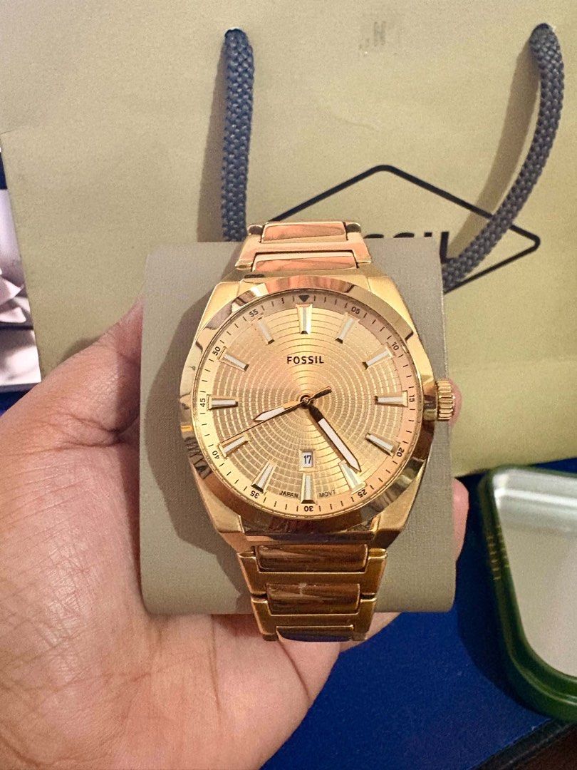 Fossil Rose Gold Watch with Date Window (Category: Men's Watches) located in Pasig City. Submitted by bjlaxamana (Listing ID 1463621416, Image 1). Description: - Elegant rose gold Fossil watch - Convenient date window at 3 o'clock - Beautiful textured dial pattern - Comes with original Fossil tin and box - Includes instruction manual - Versatile for everyday wear or special occasions.