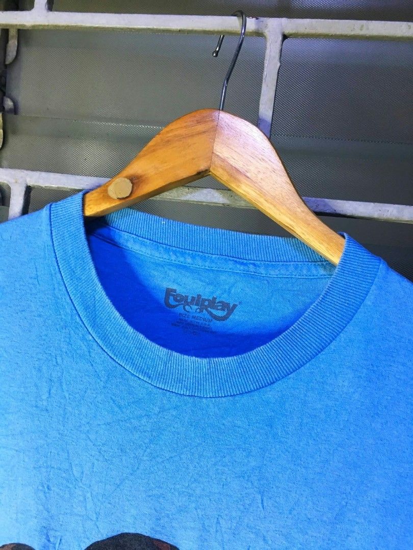 Foulplay Blue Graphic T-Shirt (Category: Tshirts & Polo Shirts ) located in Quezon City. Submitted by panicbuyer461 (Listing ID 1463684547, Image 2). Description: FOULPLAY Official Merch Medium on printed tag 19.5 width 27 length No flaws Beefy neck Very minimal sign of usage 1k.