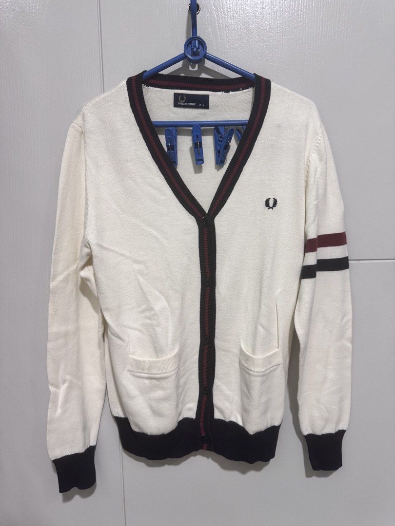 Fred Perry White Cardigan Unisex (Category: Coats, Jackets and Outerwear) located in Manila. Submitted by rai.dln (Listing ID 1463585778, Image 1). Description: Classic white Fred Perry cardigan ₱550 - Medium on tag but fits Large frame for female - Features iconic laurel wreath logo on chest - good as new 📍 Taft Manila.
