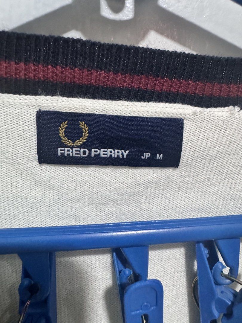 Fred Perry White Cardigan Unisex (Category: Coats, Jackets and Outerwear) located in Manila. Submitted by rai.dln (Listing ID 1463585778, Image 3). Description: Classic white Fred Perry cardigan ₱550 - Medium on tag but fits Large frame for female - Features iconic laurel wreath logo on chest - good as new 📍 Taft Manila.