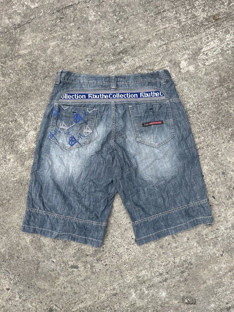 FUBU The Collection Denim Shorts (Category: Shorts) located in Manila. Submitted by zentree_04ef04 (Listing ID 1463595733, Image 2). Description: - FUBU The Collection denim shorts - Classic blue wash with subtle fading - Unique embroidered details on back pockets - Secure button and zip closure - Convenient belt loops - Perfect for everyday casual wear.