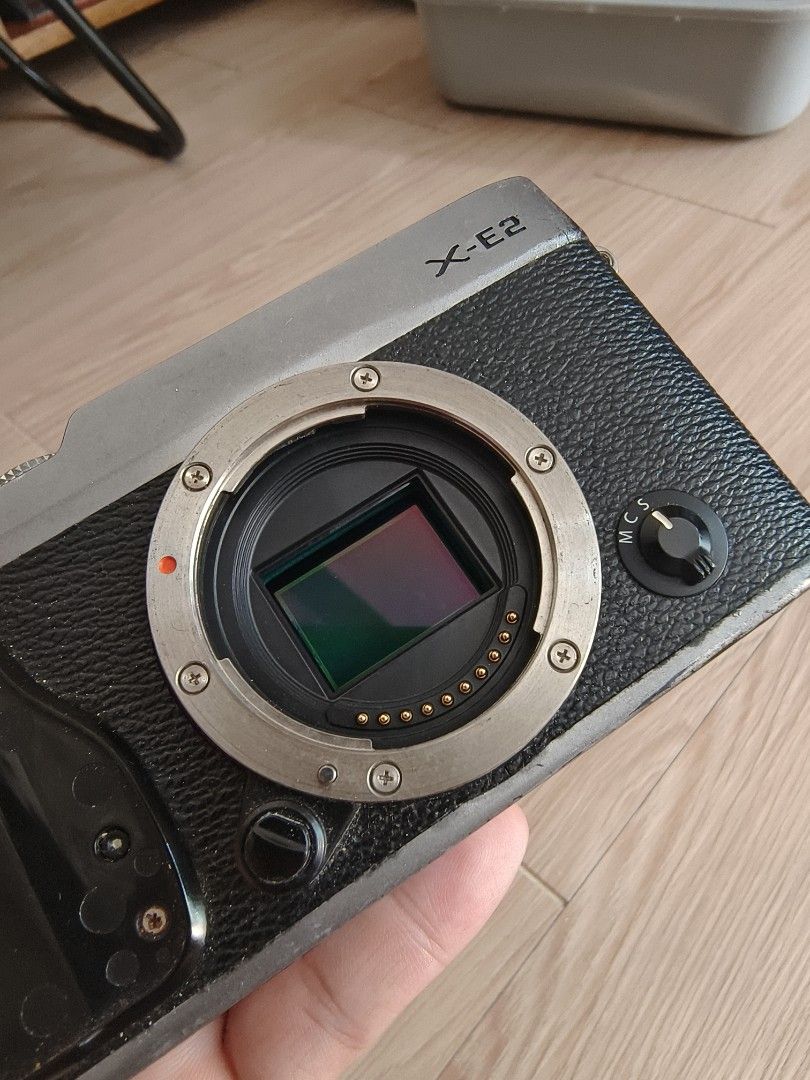 Fujifilm XE-2s (Category: Cameras) located in Marikina City. Submitted by kylcrz9 (Listing ID 1463628958, Image 3). Description: Fujifilm XE-2s with ttartisan AF 27mm f2.8 in good working condition issues: - Leather of front grip had fallen off but easily replaceable and won't affect the performance - Minor fading of paint on some parts of body but common on cameras of this age.