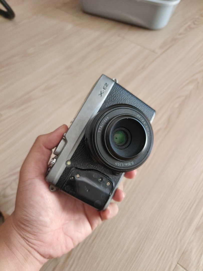 Fujifilm XE-2s (Category: Cameras) located in Marikina City. Submitted by kylcrz9 (Listing ID 1463628958, Image 1). Description: Fujifilm XE-2s with ttartisan AF 27mm f2.8 in good working condition issues: - Leather of front grip had fallen off but easily replaceable and won't affect the performance - Minor fading of paint on some parts of body but common on cameras of this age.
