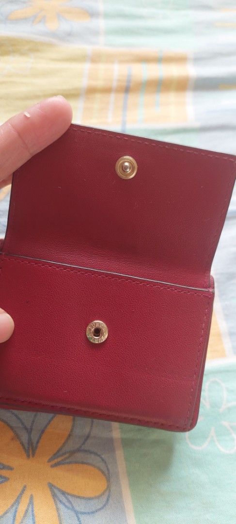 Furla Burgundy Leather Tri-fold Wallet (Category: Luxury Bags & Wallets) located in Baguio. Submitted by lotus_blossom (Listing ID 1463556252, Image 3). Description: - Authentic Furla tri-fold wallet - Rich burgundy leather - Secure snap closure - Multiple interior card slots - Convenient coin pocket - Compact and stylish design - Minimal cards lang po, siguro 2 or 3 lang ang Kaya - FLAW, shown on last picture, no other flaws - buyer shoulders sh