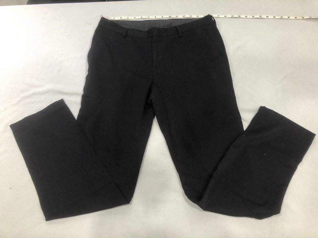 G2000 Man Slim Fit Black Pants Size 32 (Category: Trousers) located in Manila. Submitted by janmichael26601 (Listing ID 1463582661, Image 1). Description: - Brand: G2000 - Color: Black - Fit: Slim Fit - Size: 32 Waist, 28 Inseam - Style: Classic, versatile for work or casual wear - Closure: Button and zip - Pockets: Two back pockets with button closure - Measurements: Detailed in photos - Condition: Ready to ship.