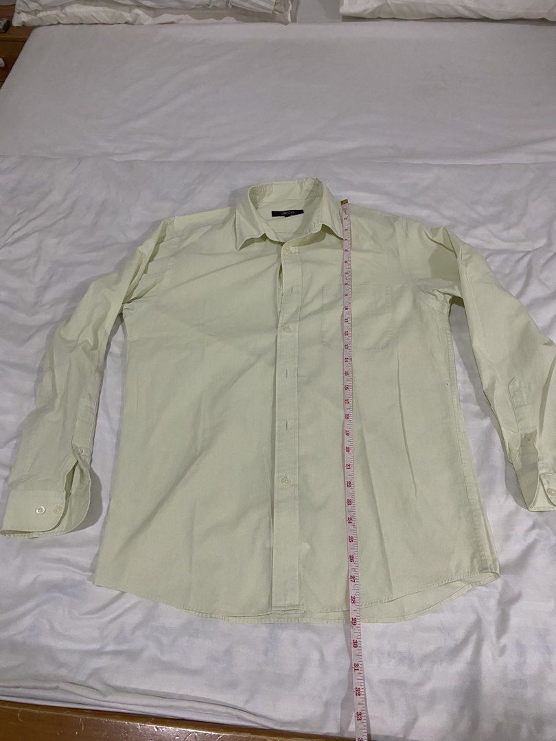 G2000 Olive Green Long Sleeve Button Up Shirt (Category: Formal Shirts) located in Quezon City. Submitted by michaelan71320 (Listing ID 1463711026, Image 2). Description: - Light yellow long sleeve shirt - Button-up style with a collar - Features a chest pocket - Versatile for casual or smart casual outfits - Measurements available in photos - Please check photos for all details G2000 Decluttering .