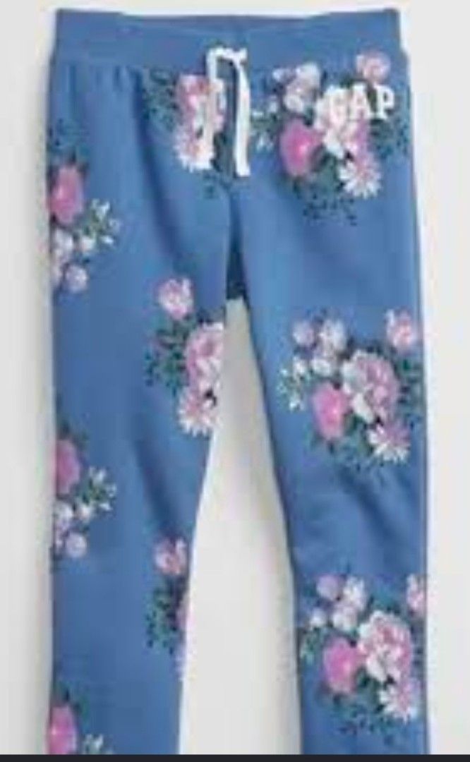 GAP Blue Floral Sweatpants Joggers (Category: Joggers) located in Quezon City. Submitted by shinereign (Listing ID 1463633834, Image 3). Description: - Cute blue sweatpants from GAP - All-over floral print with pink and white flowers - Elastic waistband with drawstring - Ribbed cuffs - Ideal for lounging or casual wear - Comfortable and stylish available size XL (12)''L(10) .