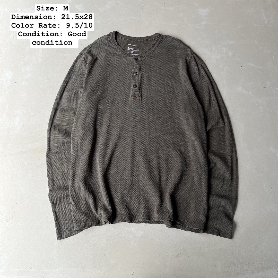 Gap Men's Long Half Button (Category: Tshirts & Polo Shirts ) located in Mandaue City. Submitted by chinsyap_03 (Listing ID 1463652482, Image 1). Description: - Grey waffle knit henley shirt from Gap - Long sleeves with button-up placket - Made from 100% cotton - Comfortable and casual style - Perfect for layering or wearing solo.