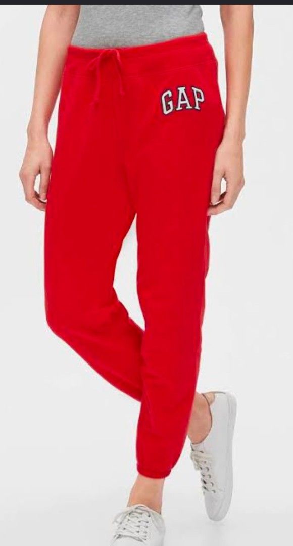 GAP Red Sweatpants Joggers with Logo (Category: Activewear) located in Quezon City. Submitted by shinereign (Listing ID 1463632672, Image 2). Description: - Bright red GAP sweatpants - Classic embroidered GAP logo on left leg - Adjustable drawstring waist - Comfortable for lounging or everyday wear - Brand new with original tag attached no more last price.