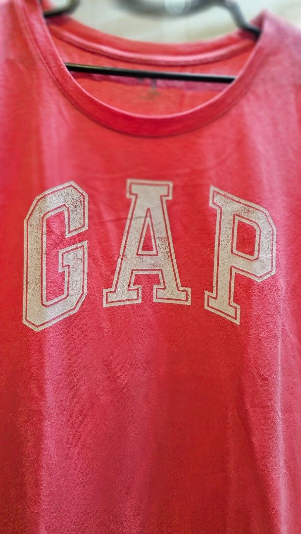 GAP Red T-shirt with Logo (Category: Shirts) located in Quezon City. Submitted by dawnest (Listing ID 1463625699, Image 2). Description: - Classic pink GAP t-shirt - Features iconic GAP logo on the front - Made in Indonesia - Measurements: Approx. 26 inches length, 16.5 inches width - Ideal for casual everyday wear.