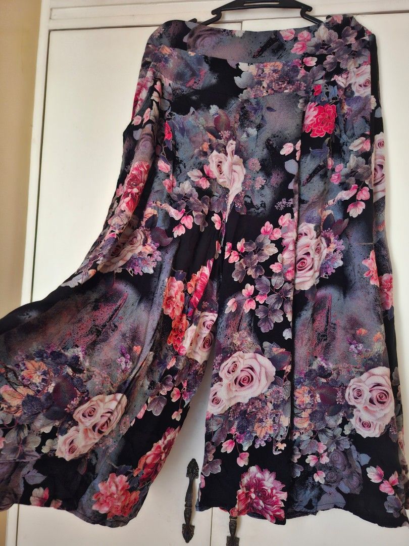 Garterized skort like pants (Category: Other Bottoms) located in Apalit. Submitted by anyagirl13 (Listing ID 1463604077, Image 3). Description: - Flowy skort like pants - Beautiful all-over floral print with pink roses and other flowers - Fabric with a nice drape - Versatile: great for casual outings and office artire - Can fit up to XXL because it is garterized.