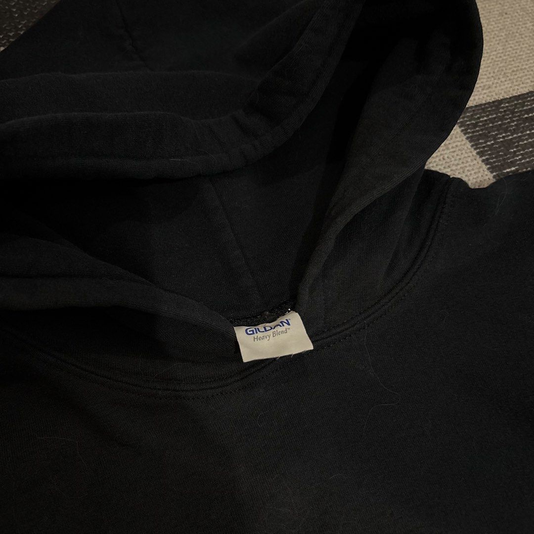 Gildan Heavy Blend Black Hoodie (Category: Hoodies) located in Makati City. Submitted by sseurekiii (Listing ID 1463722182, Image 2). Description: - Classic black Gildan hoodie - Heavy blend material for a substantial feel - Standard pullover style - Features a front pocket and hood - Perfect for layering or standalone wear - Versatile for everyday use.