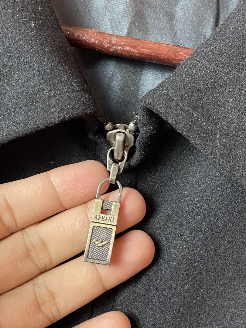 GIORGIO ARMANI BLACK JACKET (Category: Coats, Jackets and Outerwear) located in Quezon City. Submitted by loloyz123 (Listing ID 1463694849, Image 3). Description: GIORGIO ARMANI BLACK JACKET Condition: Very good Color rate: 10/10 Color: Black/ Polyester 90% Size: L: 29 W: 23 inches.