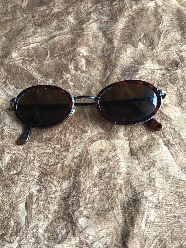 Giorgio Armani sunglass original (Category: Sunglasses & Eyewear) located in Baguio. Submitted by agozun61 (Listing ID 1463570886, Image 2). Description: Original sunglass Giorgio Armani color brown size 51 .Walang Grado .