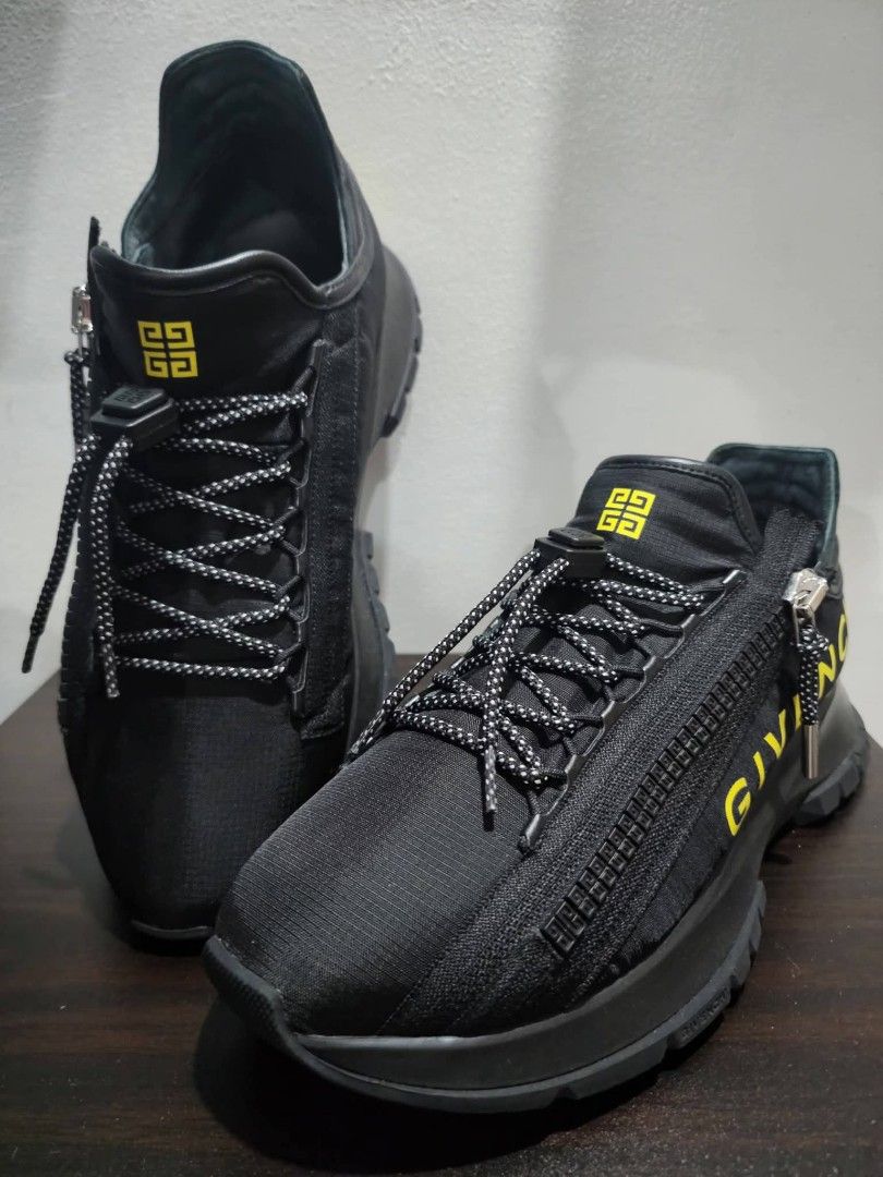 Givenchy Black Zip Sneakers (Category: Sneakers) located in Manila. Submitted by vine_branhces (Listing ID 1463640523, Image 1). Description: - Authentic Black Givenchy Sneakers - Eye-catching Yellow Logo Detail - Dual Closure: Zip and Laces - Comfortable and Stylish Chunky Sole - Ideal for Everyday Casual Wear.