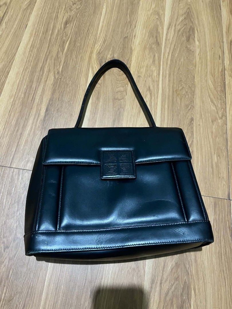 Givenchy vintage 4G leather handbag (Category: Luxury Bags & Wallets) located in Bulacan. Submitted by nifftyythrifty (Listing ID 1463668081, Image 1). Description: Givenchy vintage 4G black leather handbag.