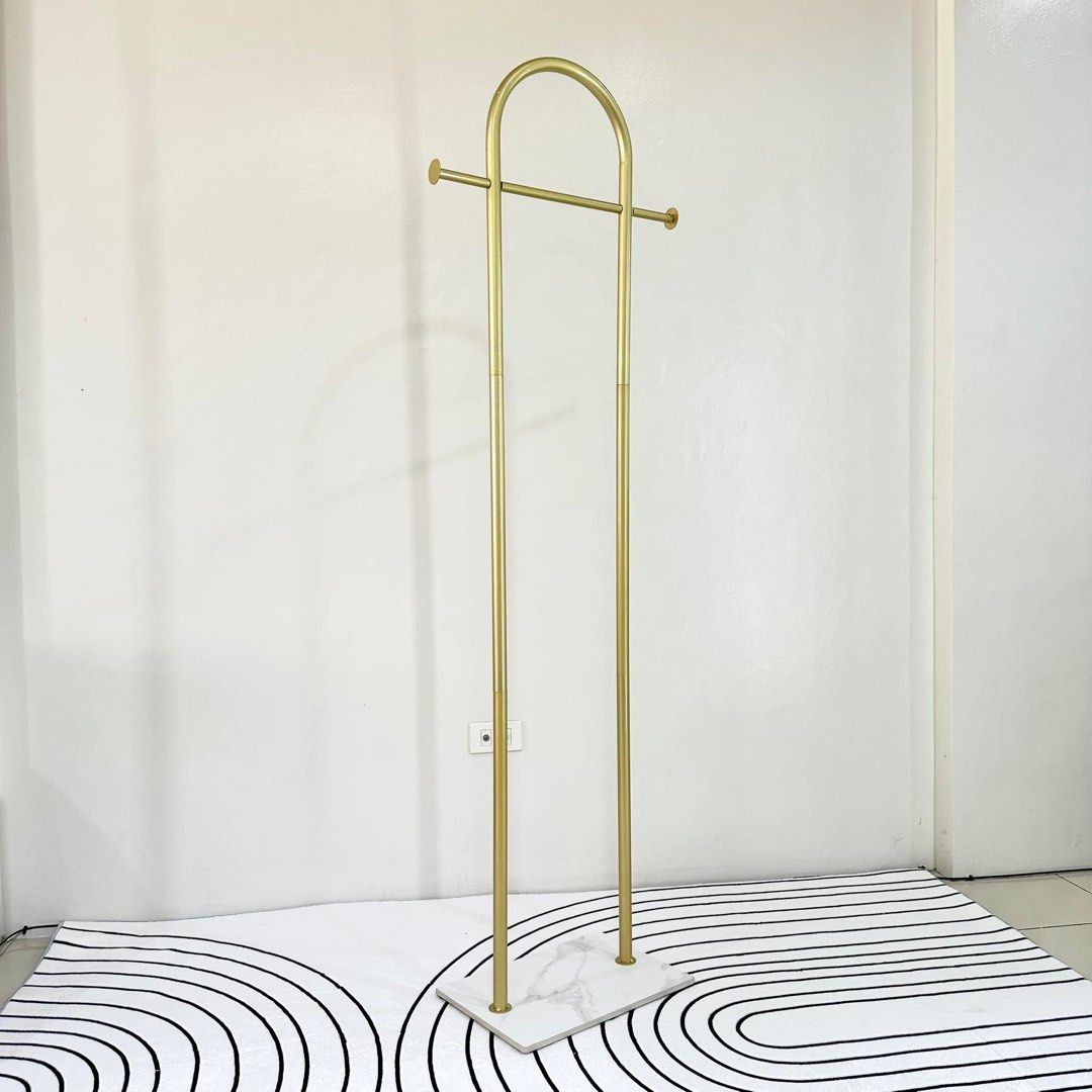 Gold clothes rack (Category: Clothes Drying Rack) located in Marikina City. Submitted by lovegoeson (Listing ID 1463569718, Image 1). Description: .