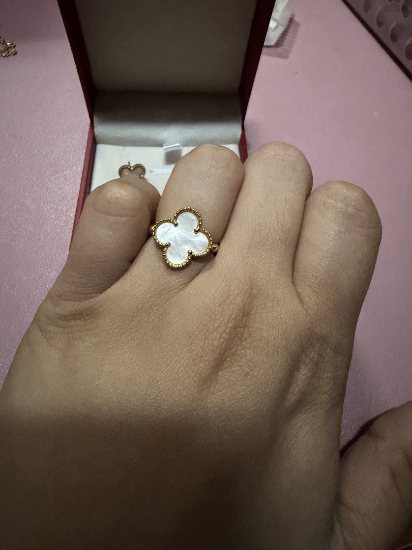 Gold Clover Ring and Earrings Set with White Stone (Category: Earrings) located in Pasig City. Submitted by aprilluxcloset0812 (Listing ID 1463737573, Image 3). Description: - Beautiful gold clover set - Includes matching ring and stud earrings - Clover design accented with small white stones - Ring band features a beaded texture - Ideal for gifting or personal treat Fashion Accessories ONLY, NO BOX (Box is for photo ops purpose only) Small ziplo