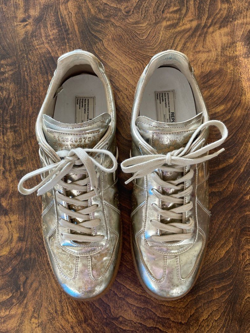 Gold Maison Margiela Metallic Shoes (Category: Sneakers) located in San Fernando. Submitted by larchivefeminine (Listing ID 1463582009, Image 1). Description: Gold Maison Margiela Metallic Shoes CONDITION 9/10 METALLIC FADING SIGNS OF WEAR LAMBSKIN SIZE 41 ON TAG .