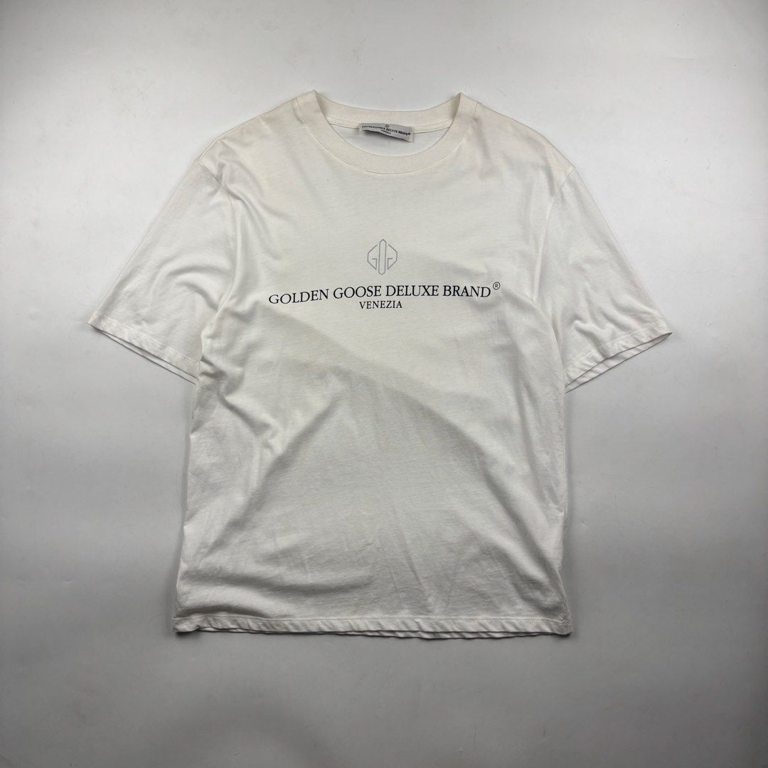 Golden Goose Slogan Shirt (Category: Tshirts & Polo Shirts ) located in Makati City. Submitted by ragrepository (Listing ID 1463680633, Image 1). Description: Golden Goose Slogan Shirt Tagged as XS Length- 27” Pit to pit- 21” Sleeves- 10” Shoulder-20” Condition- 9/10 Flaw- None .
