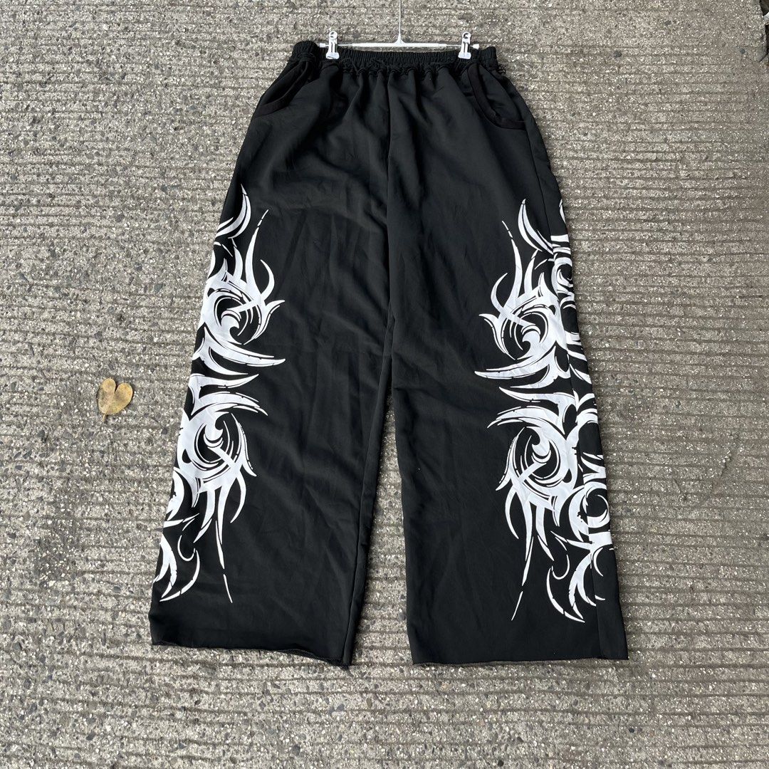 Gothic Graffiti Wideleg Baggy Pants (Category: Other Bottoms) located in Mandaue City. Submitted by hannahitems (Listing ID 1463598731, Image 1). Description: Gothic Graffiti Wideleg Baggy Pants 28-34 waistline 40 length 12.5 hem Asnew -650.