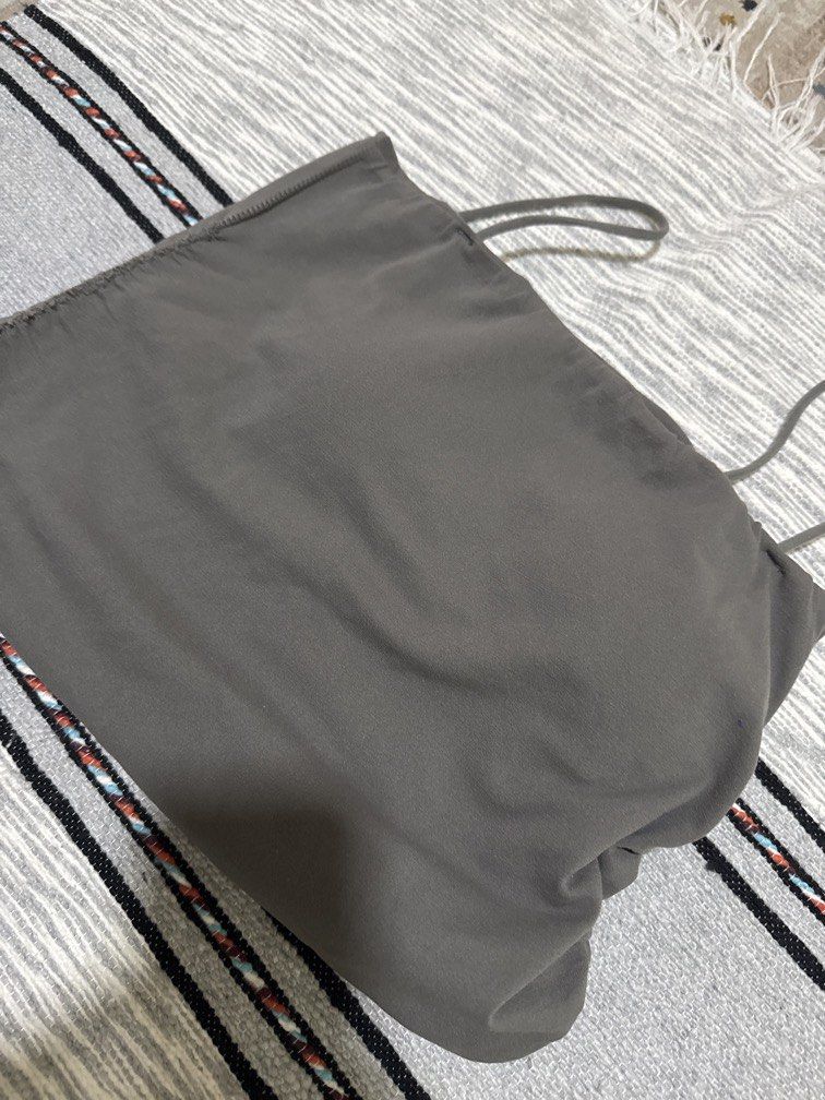 Gray singlet (Category: Activewear) located in Kuala Lumpur. Submitted by aphrodite_athena (Listing ID 1463639080, Image 1). Description: Slightly padded and slightly defective at the side..