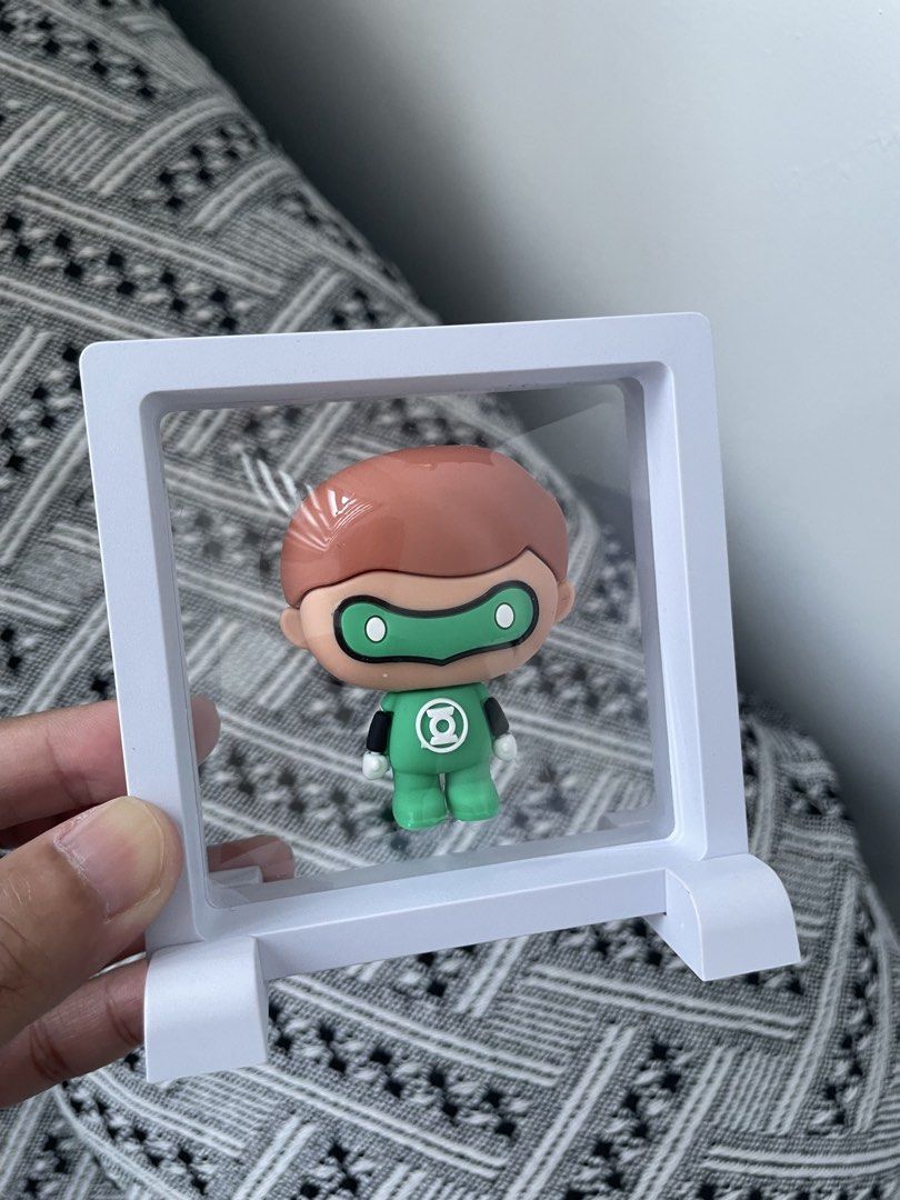 Green Lantern Chibi Figure in Display Case (Category: Figurines & Statues) located in Tanza. Submitted by thebeautyinall (Listing ID 1463615547, Image 3). Description: - Display case with stand is FREE - Adorable Green Lantern chibi figure - Approximately 3 inches tall - Includes clear display case and stand - Ideal for DC Comics enthusiasts and collectors - Display case dimensions: approx. 4x4 inches - Made in China.