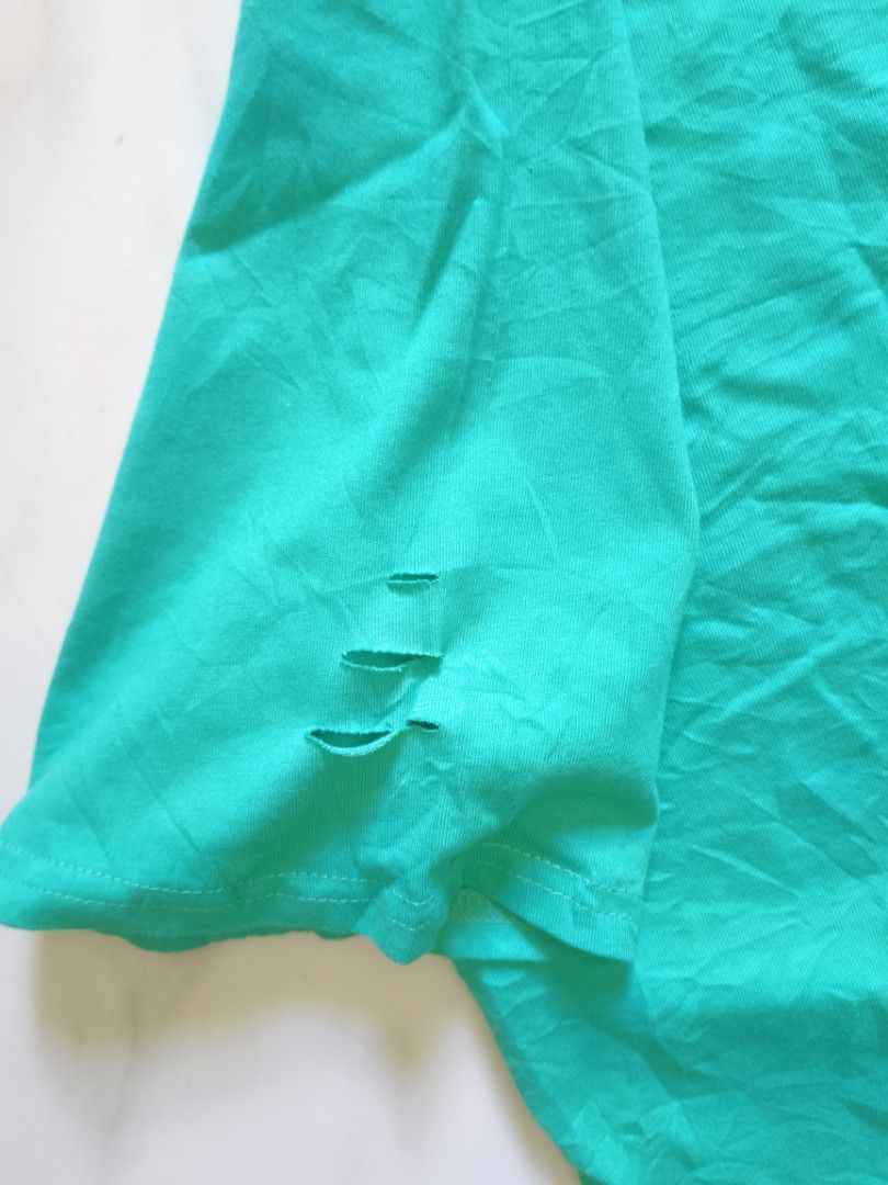 Green top (Category: Others Tops) located in Las Pinas. Submitted by erikashoppe (Listing ID 1463571061, Image 2). Description: .