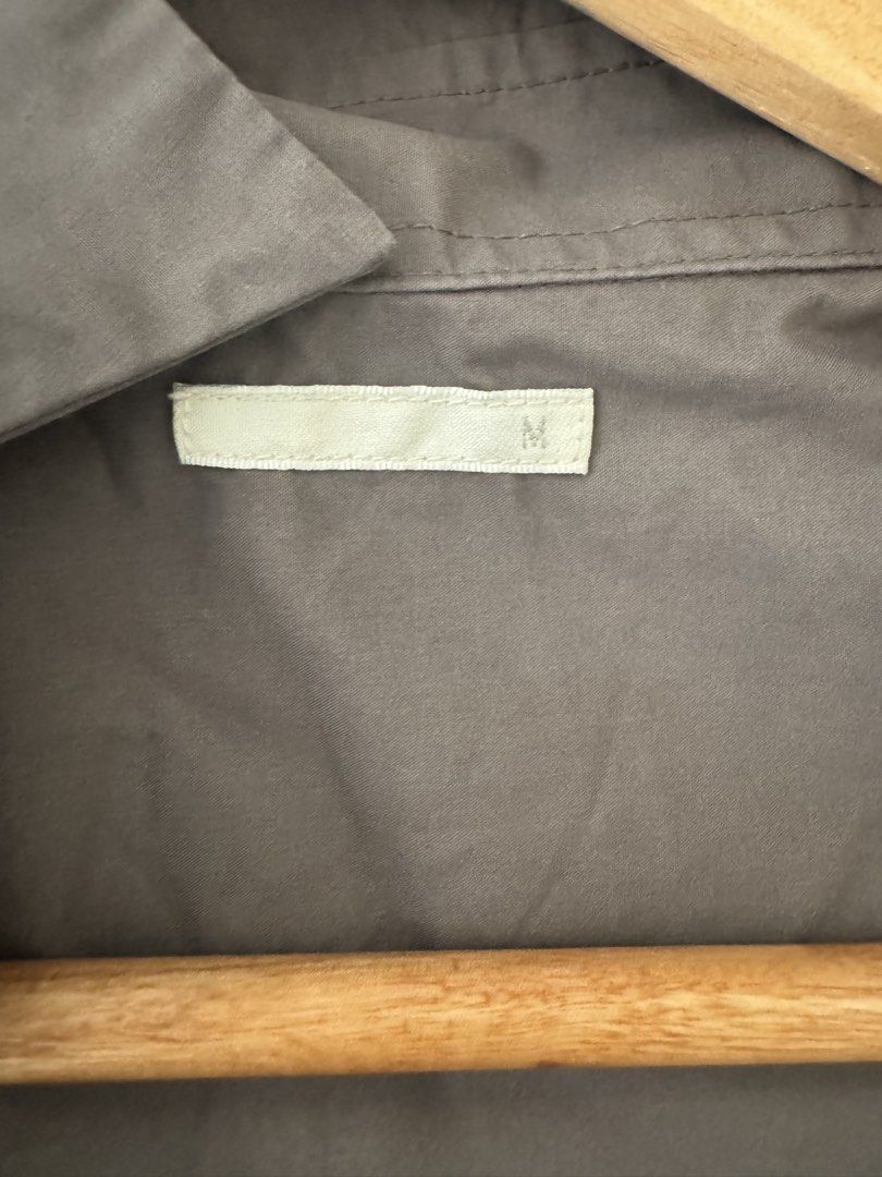 GU Band Collar Shirt - Grey - Size M (Category: Tshirts & Polo Shirts ) located in Rizal. Submitted by thrifty.mom (Listing ID 1463658107, Image 3). Description: - GU Grey Band Collar Shirt - Size: Medium (M) - Long sleeves with button cuffs - Single chest pocket - Versatile for casual and smart-casual wear - Easy to style with various bottoms.