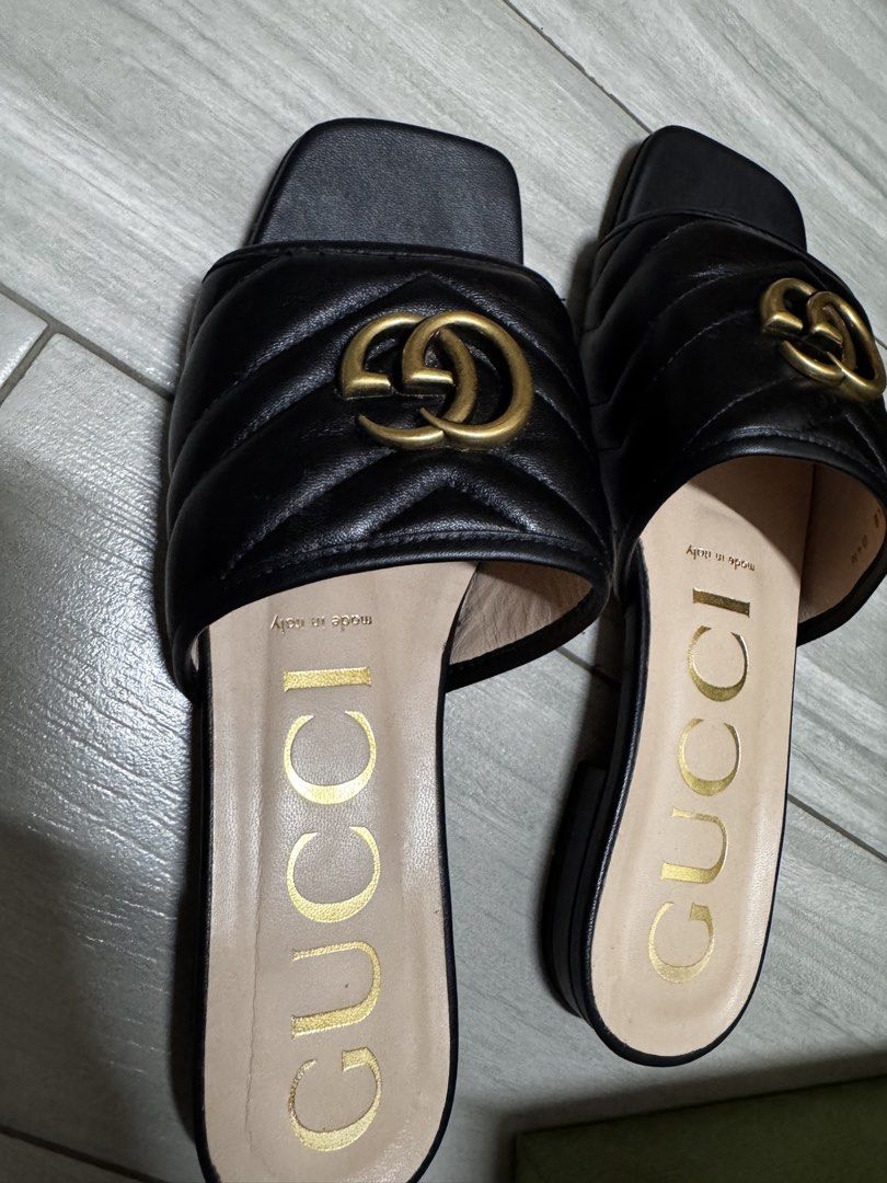 Gucci Black Quilted GG Marmont Slides (Category: Sneakers & Footwear) located in Paranaque City. Submitted by lersprelovedclothes (Listing ID 1463630138, Image 3). Description: - Authentic Gucci GG Marmont Slides - Color: Black - Features iconic GG Marmont quilting - Gold-tone hardware - Made in Italy - Includes original box and dust bag - Super comfortable and stylish for everyday wear - A classic Gucci piece.
