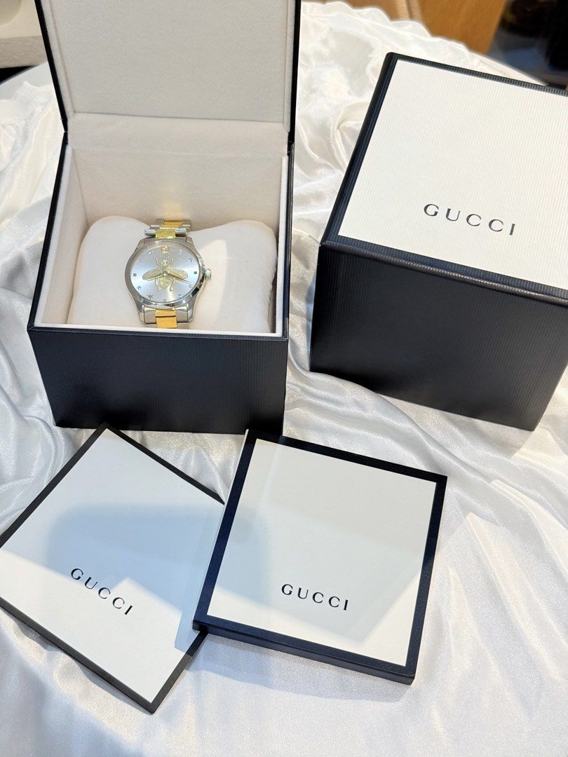 Gucci G-Timeless Bee Watch (Category: Luxury Watches) located in Taguig. Submitted by eunicesuperb (Listing ID 1463635448, Image 2). Description: - Authentic Gucci G-Timeless Watch - Iconic Bee Motif on Dial - Two-Tone Stainless Steel Bracelet - Comes with Original Box and Packaging - Versatile for Everyday or Special Occasions.