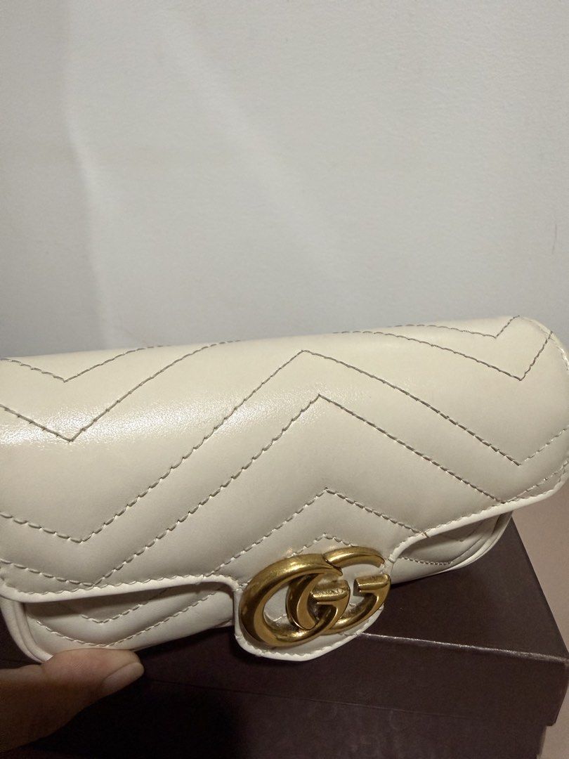 Gucci Marmont mini (Category: Luxury Bags & Wallets) located in Marilao. Submitted by archivesbysof (Listing ID 1463576920, Image 2). Description: 🤍 Gucci Marmont Super Mini — White Classic and easy to style. Perfect for dinners, events, or when you just need the essentials. • Clean interior • In good pre-loved condition • With a small stain at the bottom (see photos) • Overall still looks beautiful when worn ✨ Selling at a good price considerin