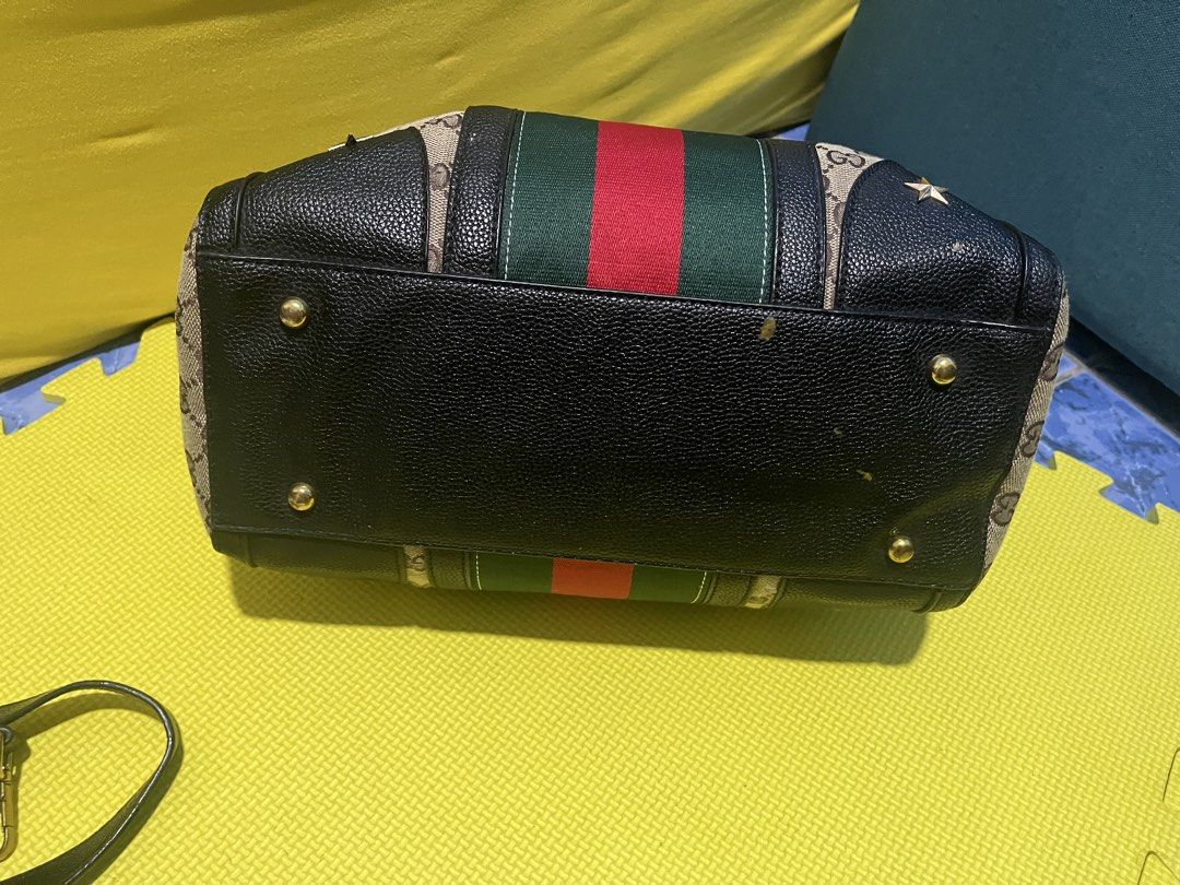 Gucci two way hand bag (Category: Cross-body Bags) located in Paranaque City. Submitted by lcristobal (Listing ID 1463667172, Image 3). Description: no issue kept in the closet for a while decluttering width 30 cm height 22cm .