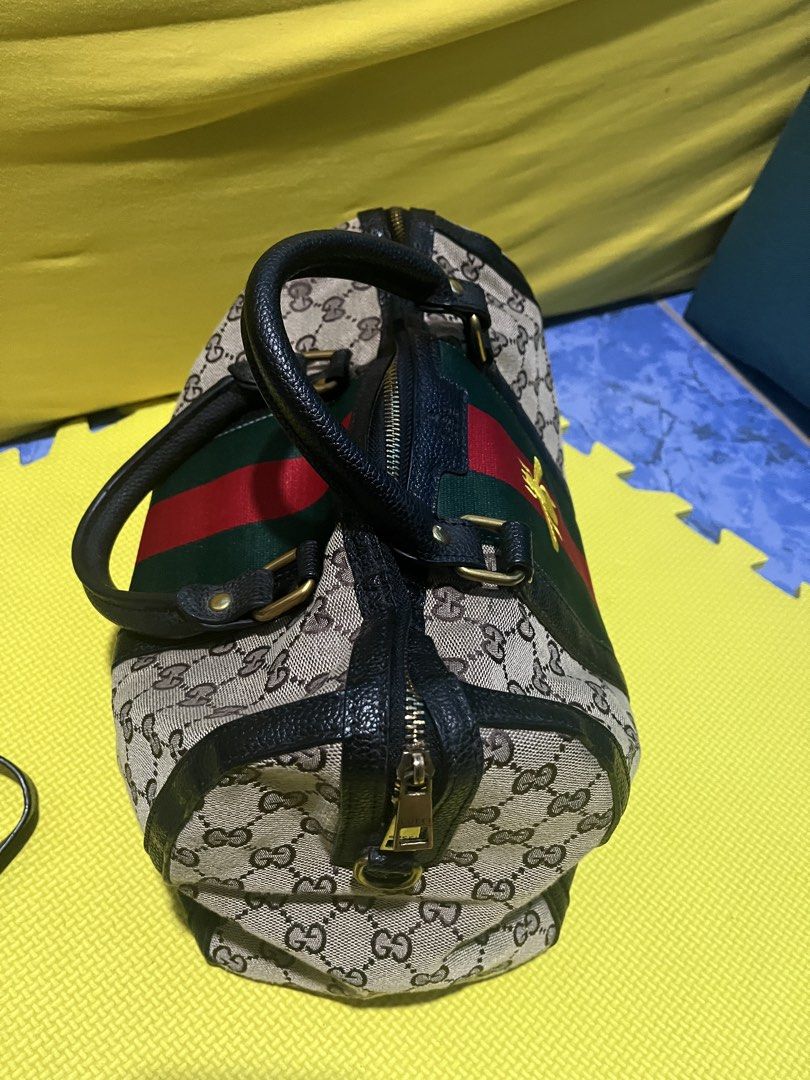 Gucci two way hand bag (Category: Cross-body Bags) located in Paranaque City. Submitted by lcristobal (Listing ID 1463667172, Image 2). Description: no issue kept in the closet for a while decluttering width 30 cm height 22cm .
