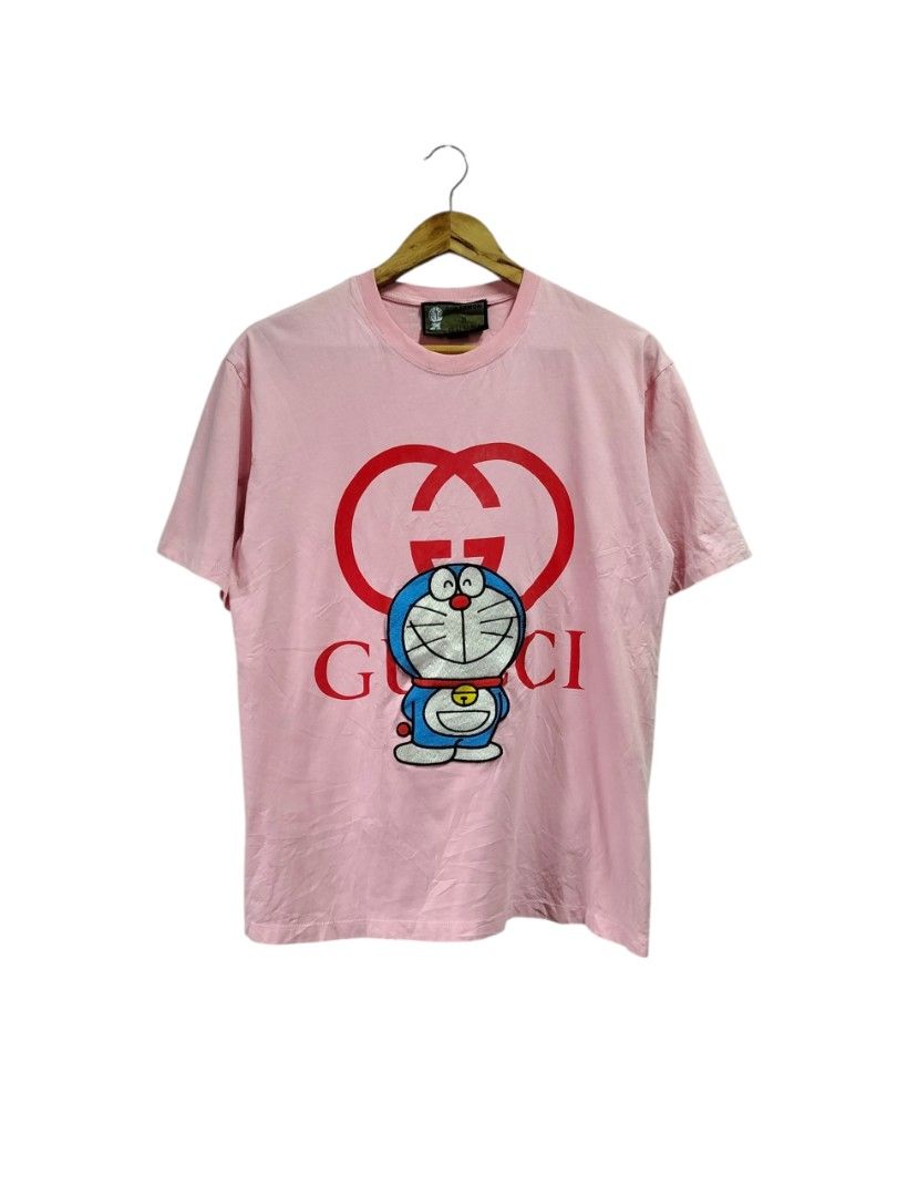 GUCCI X DORAEMON PINK SHIRT (Category: Tshirts & Polo Shirts ) located in Bayombong. Submitted by Gentlemans_ClosEt (Listing ID 1463645221, Image 1). Description: GUCCI X DORAEMON PINK SHIRT (authentic) searchable code SIZE SMALL ON TAG CAN FIT UPTO SIZE MEDIUM MEN'S DIMES: W20 X L26 EXCELLENT CONDITION NO ISSUE.