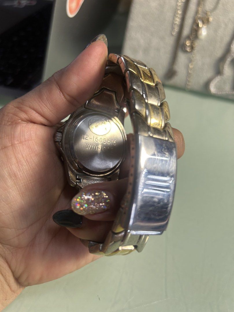 Guess Collection Quartz Watch - Purple Dial (Category: Women's Watches) located in Cavite. Submitted by mamamia73 (Listing ID 1463719451, Image 2). Description: - Guess Collection Watch - Stunning Purple Dial - Two-Tone Metal Band (Silver & Gold) - Reliable Quartz Movement - Model Number: 12-16055616.
