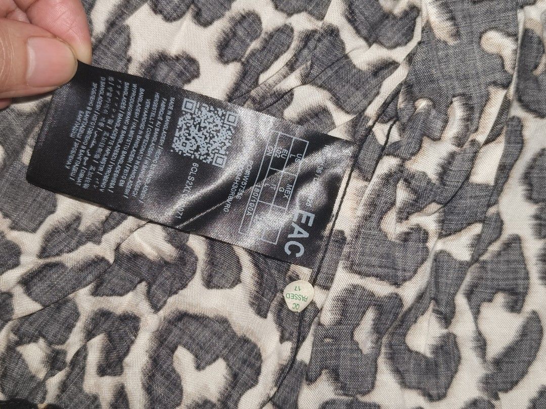 Guess Leopard Print Short Sleeve Button Up Shirt (Category: Tshirts & Polo Shirts ) located in Makati City. Submitted by nida.hernandez (Listing ID 1463728081, Image 3). Description: "Brand new with tags (BNWT) tops. Never worn, just kept in the cabinet. Selling them cleared out!" short sleeve shirt #guess #addidas #nike #tommyhilfiger #champion #freeplanet #drifit all original 💯 authentic - Eye-catching leopard print - Button-up style - Size L 
